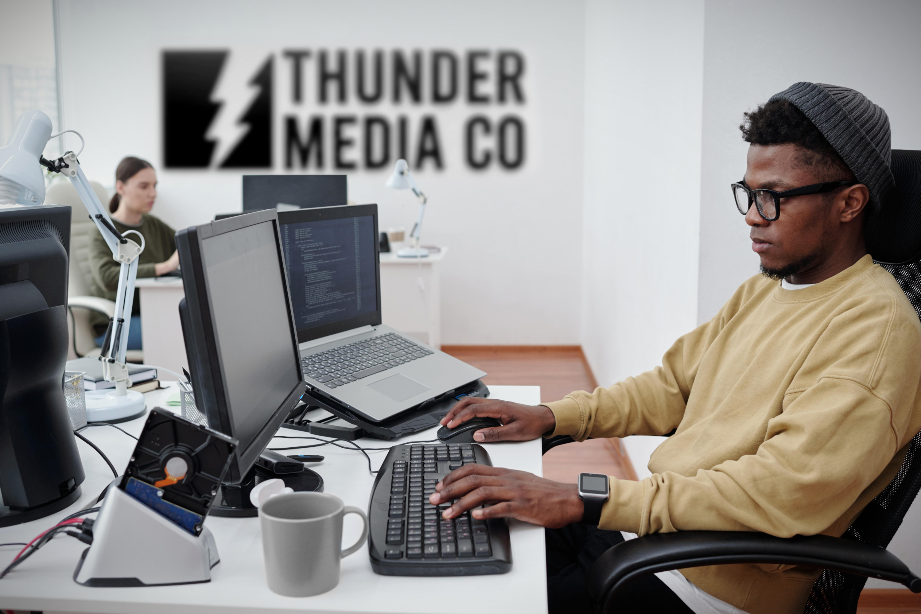 The Thunder Media Co. team at work in the office